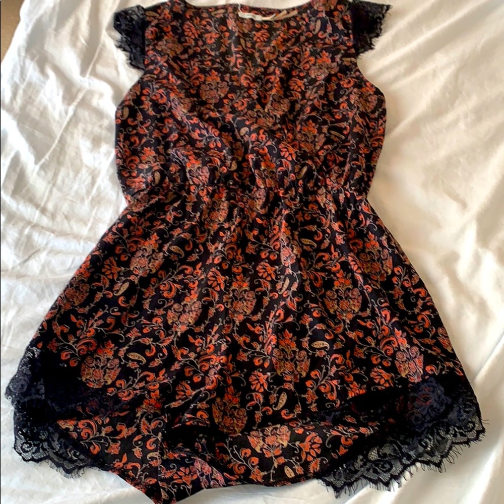 Romper with elastic waist and wrap top